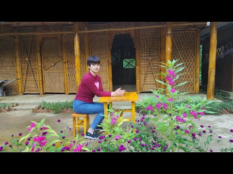 Make a wooden dining table in a bamboo house in the middle of the forest